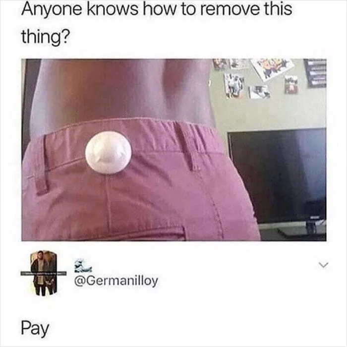 Security tag on pink pants with a clever reply saying Pay.