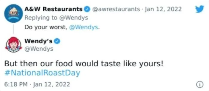 Screenshot of a witty post reply from Wendys roasting another brand.