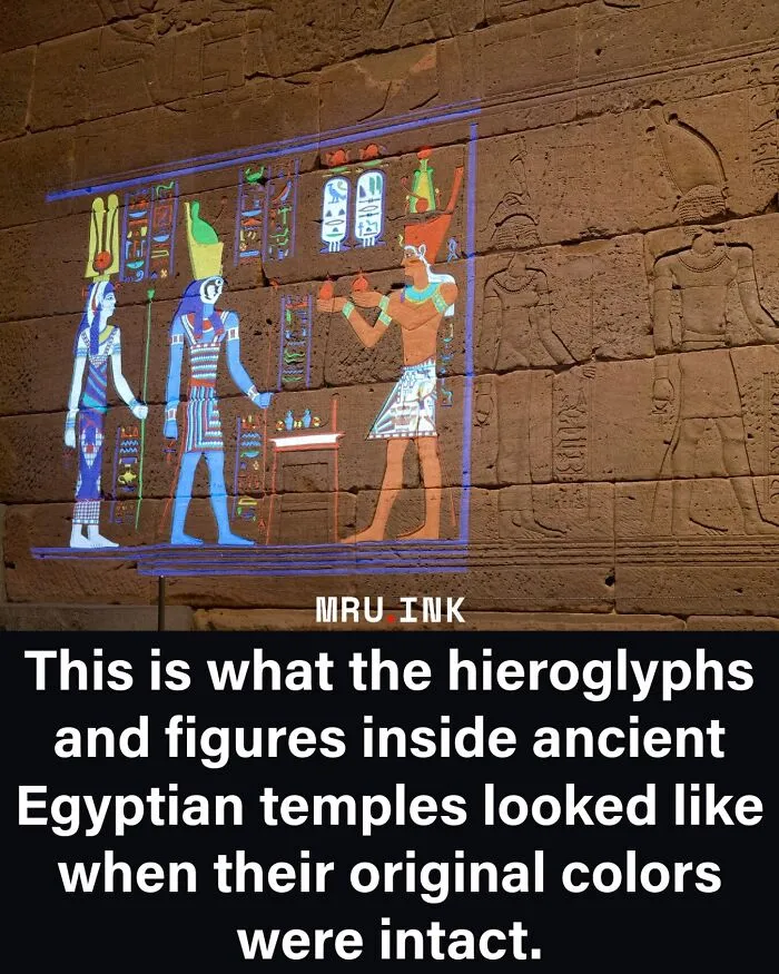 Colorful projection on ancient Egyptian hieroglyphs illustrating fascinating photos and facts