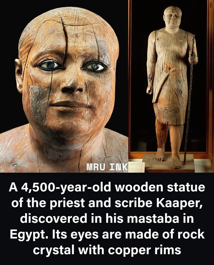 An ancient wooden statue of Kaaper with crystal eyes displaying fascinating photos from history