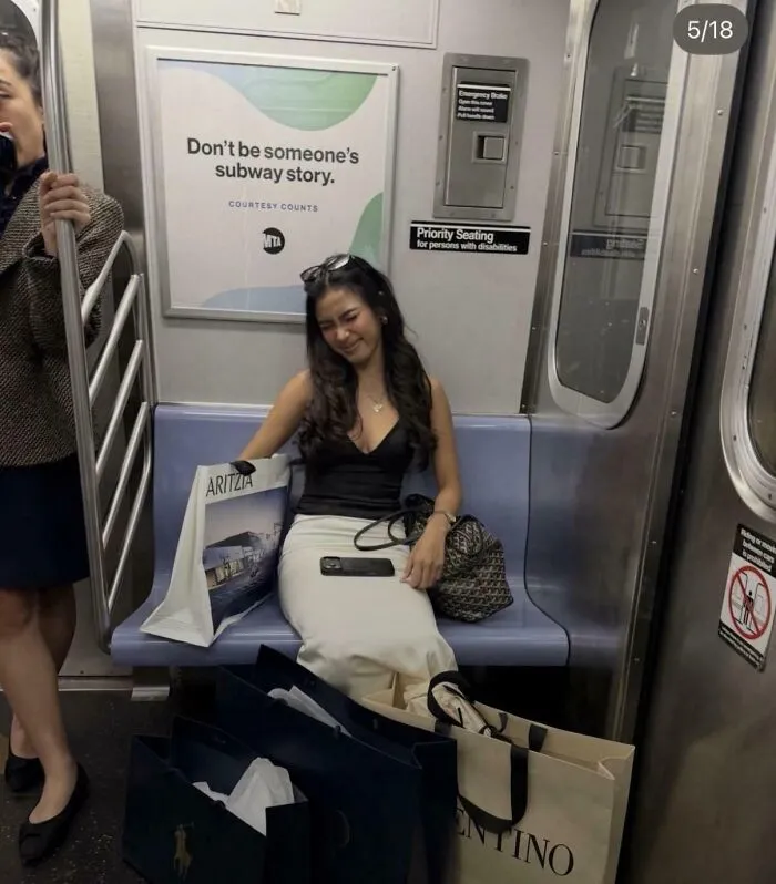 Woman sitting on a subway train surrounded by shopping bags treated as a personal content studio