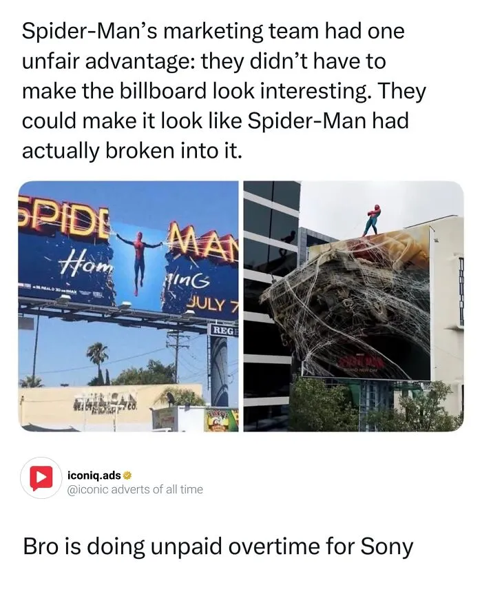 Two Spider-Man movie billboards covered in giant 3D spider webs as entertaining ads.