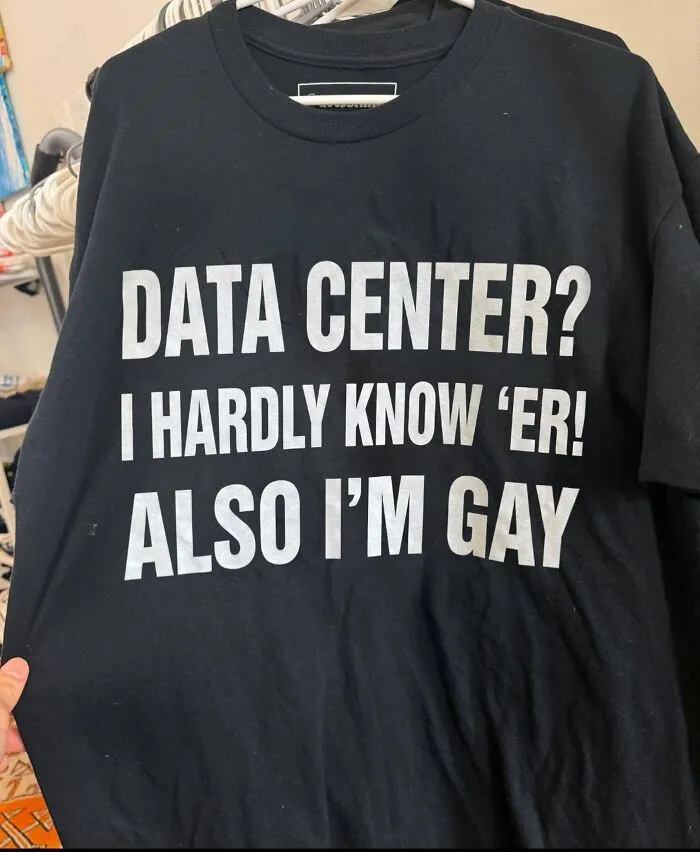 A black t-shirt with hilarious text about data centers and funny unexpected humor.