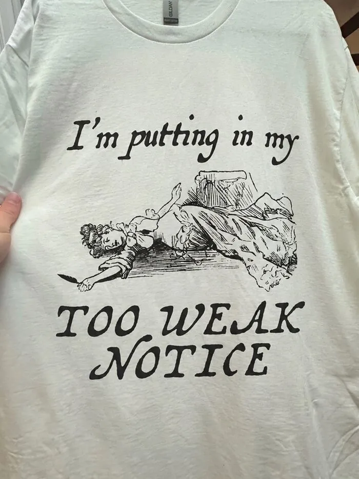 Hilarious t-shirt with a vintage illustration of a fainting woman and text reading I am putting in my too weak notice.