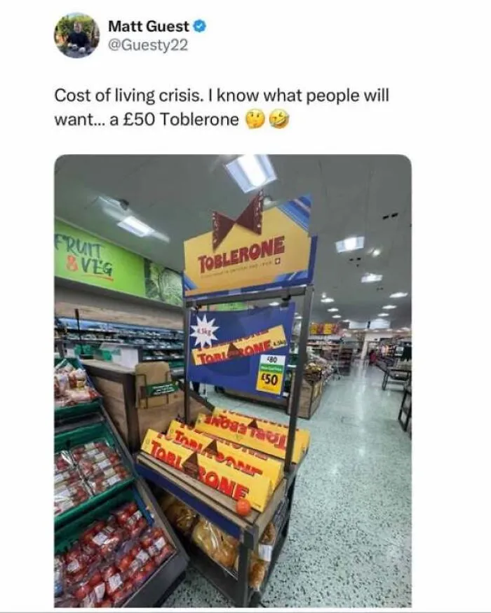 Hilarious memes about being British featuring a supermarket display selling a massive 50 pound Toblerone.