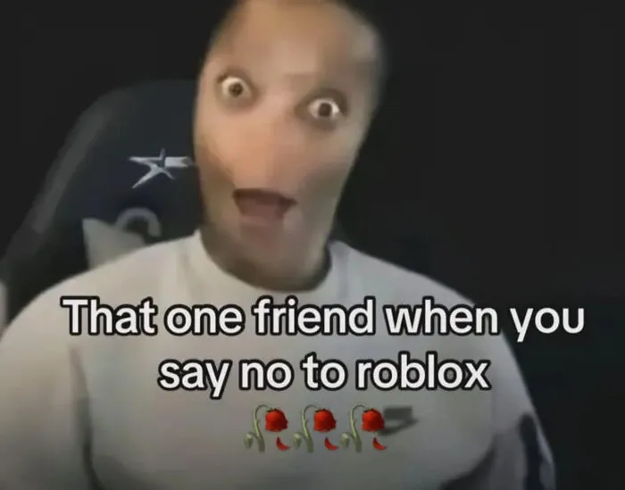 Absurd internet post featuring a face with a shocked expression and text about saying no to Roblox.