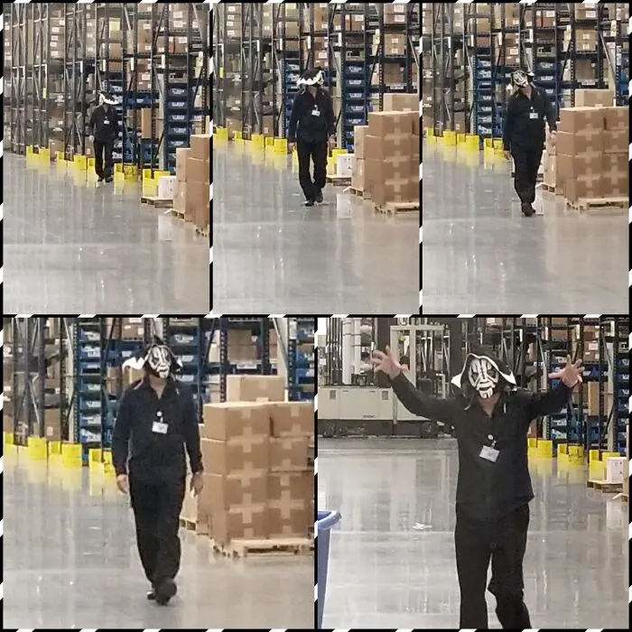 Funny Halloween photos of a warehouse worker wearing a spooky mask on the job.