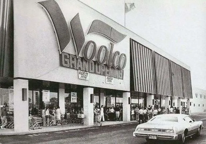 Black and white old photo of America showing the grand opening of a Woolco department store in 1974