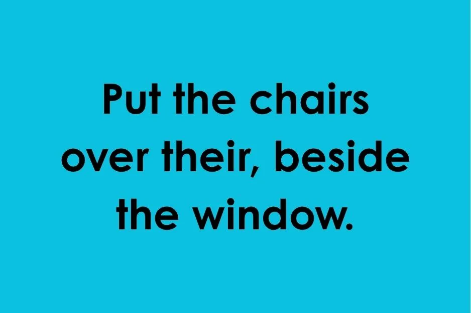 Blue background displaying sentence: Put the chairs over their, beside the window.