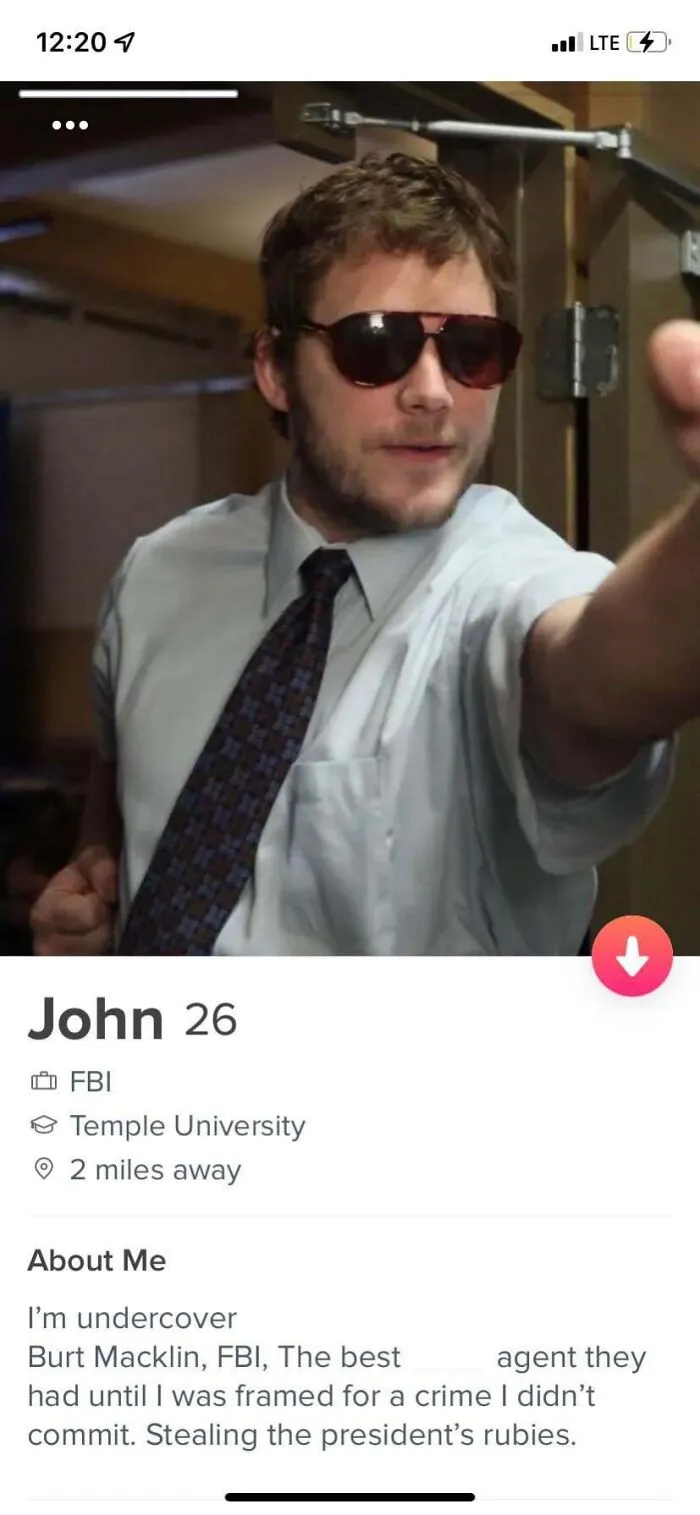 A screenshot of a funny Tinder profile featuring a man wearing sunglasses posing as an undercover FBI agent.