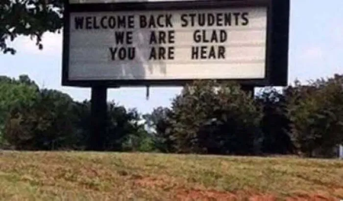 School welcome sign with a misspelling, showing people confidently wrong when making public displays.