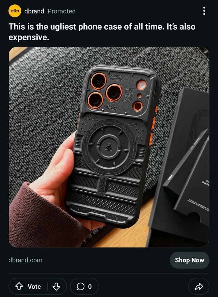 A hand holding a bulky black phone case, showcasing bad advertising fails.