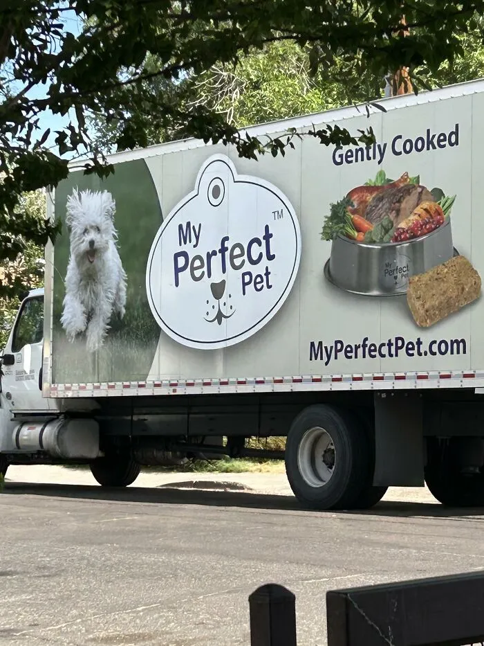 A delivery truck displaying My Perfect Pet gently cooked food, showing advertising fails with ambiguous layout.