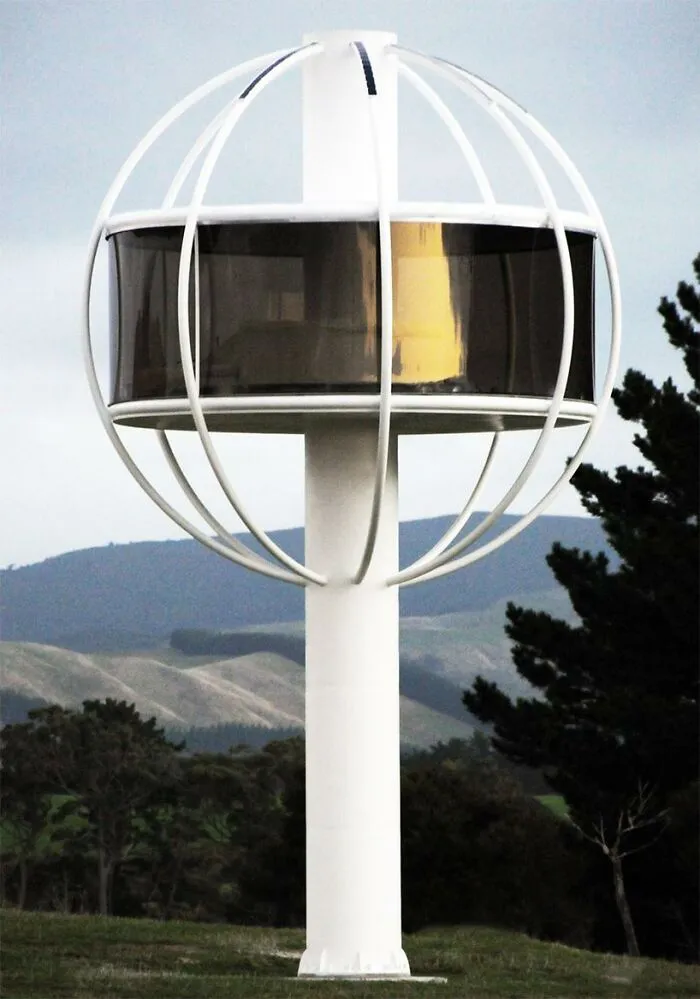Futuristic spherical building supported by a single column in nature