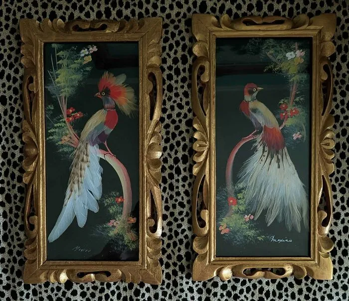 Pair of framed bird paintings with ornate gold frames on patterned fabric background thrift store find