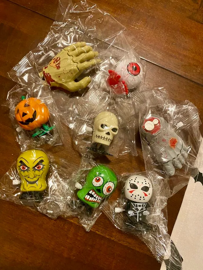 Halloween wind-up toys in spooky designs like skull and eyeball in plastic wrap