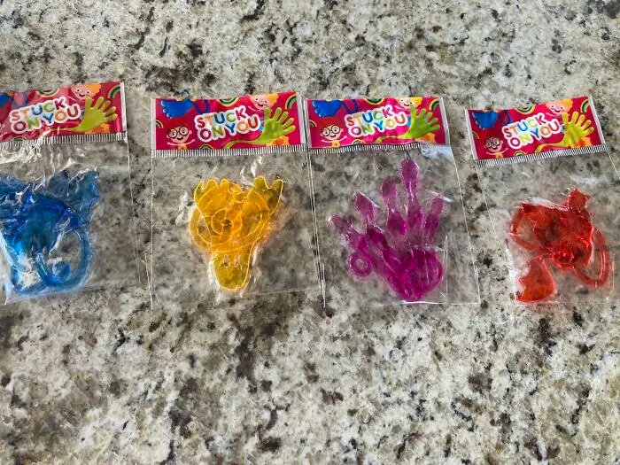 Packaged colorful sticky hand toys for Halloween treats