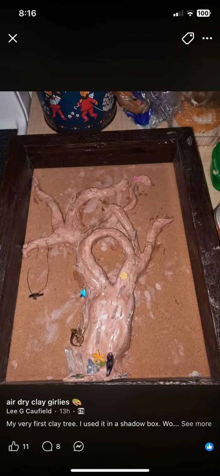 A handmade clay tree inside a dark shadow box frame as hilarious art projects.