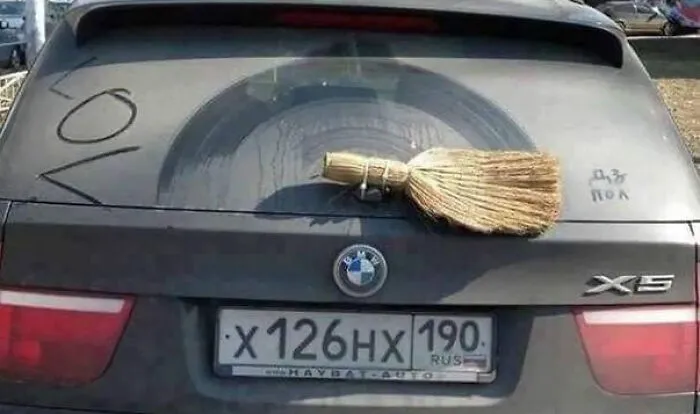 Slavic engineering car rear wiper replaced with a small straw broom