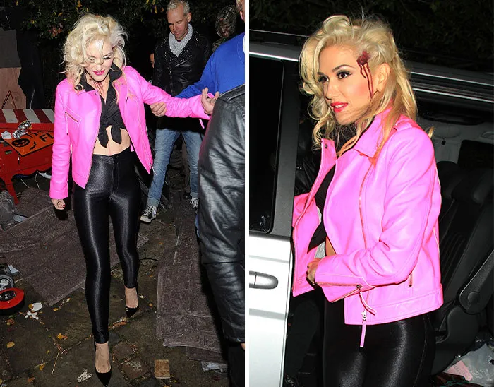 Gwen Stefani wearing a pink jacket with fake blood as part of celebrities halloween costumes