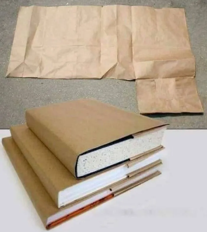 School textbooks covered in brown paper grocery bags, popular in '80s kids childhoods.