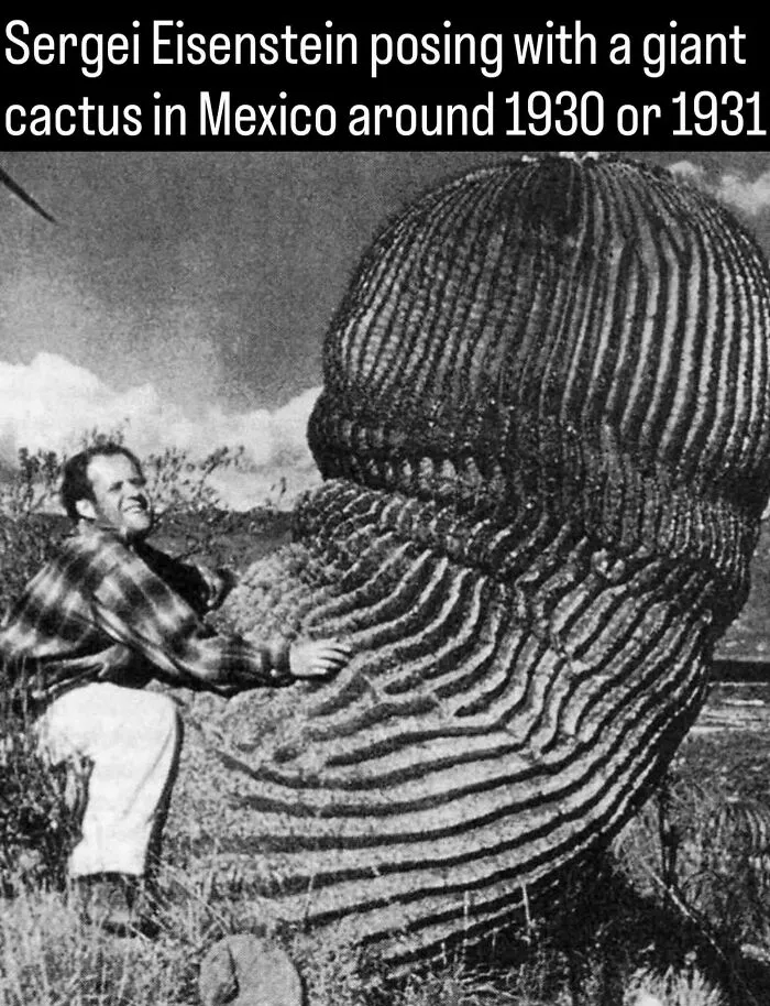 Photos about history featuring filmmaker Sergei Eisenstein posing next to a giant cactus in Mexico.