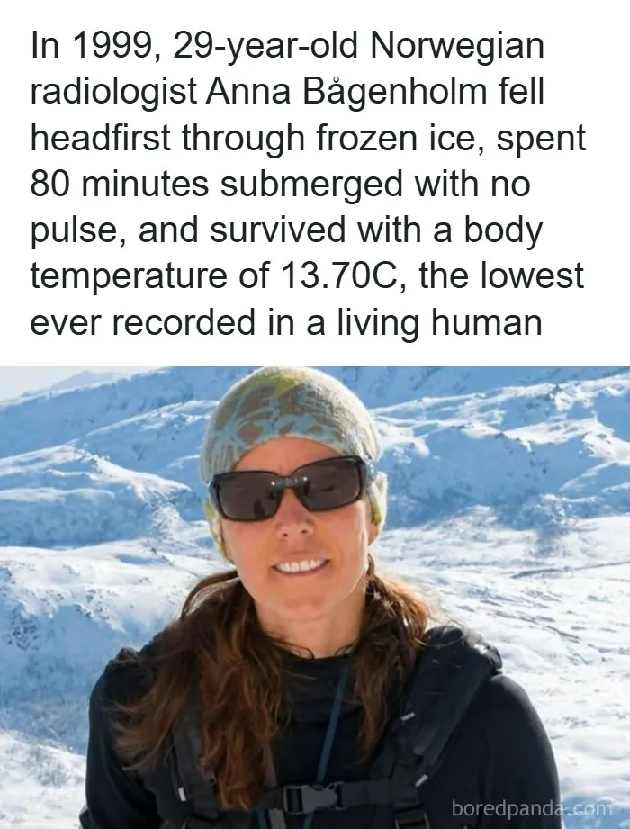 A smiling woman wearing winter gear in front of snowy mountains, highlighting creepy facts about extreme survival.