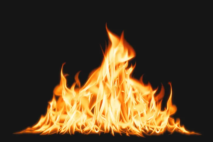 Bright orange flames burning brightly as a visual for fire safety emergency tips