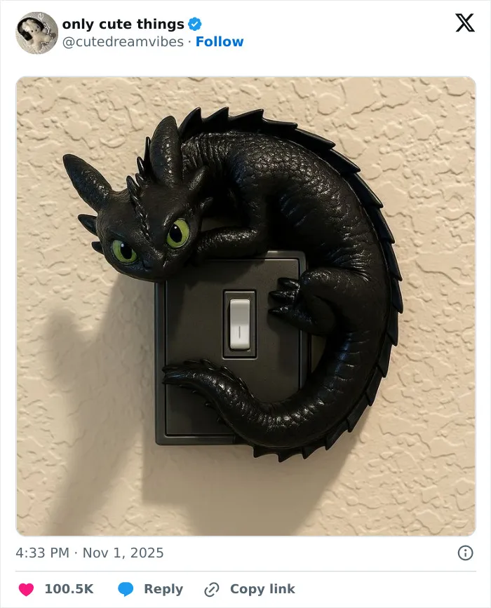 Toothless dragon figure wrapped around a light switch on a textured wall