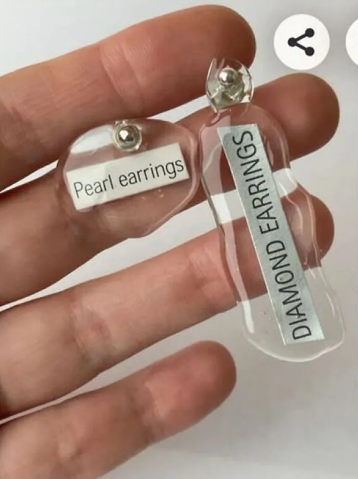 Hilarious crafts of handmade earrings labeled pearl and diamond earrings as a funny art project