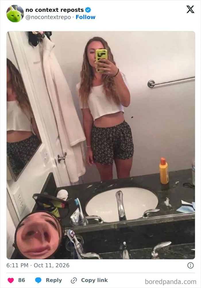 Woman taking bathroom selfie with distorted face meme