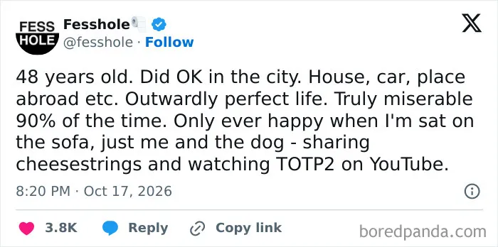 Anonymous confession tweet about being happy only when sitting on the sofa with a dog.