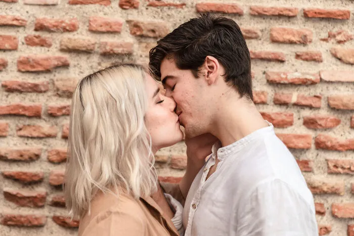 A young couple kissing, illustrating why people might decide to skip a second date
