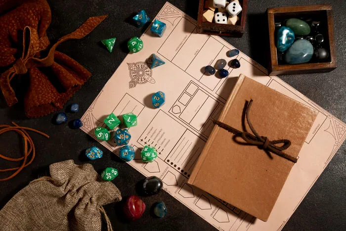 Tabletop role-playing game setup with dice and character sheet, highlighting obvious lies in gaming.