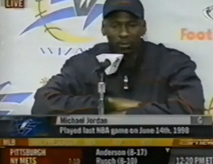 Michael Jordan speaking at a press conference broadcast on TV in 2001.