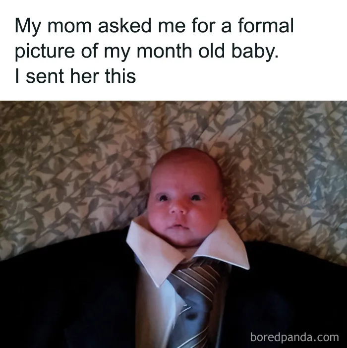 Baby dressed in formal suit for a monthly baby picture meme