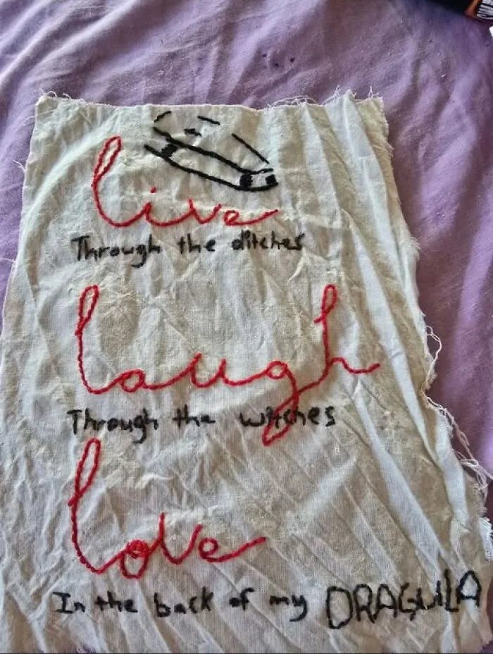 A poorly stitched embroidery on a piece of cloth depicting funny craft ideas.