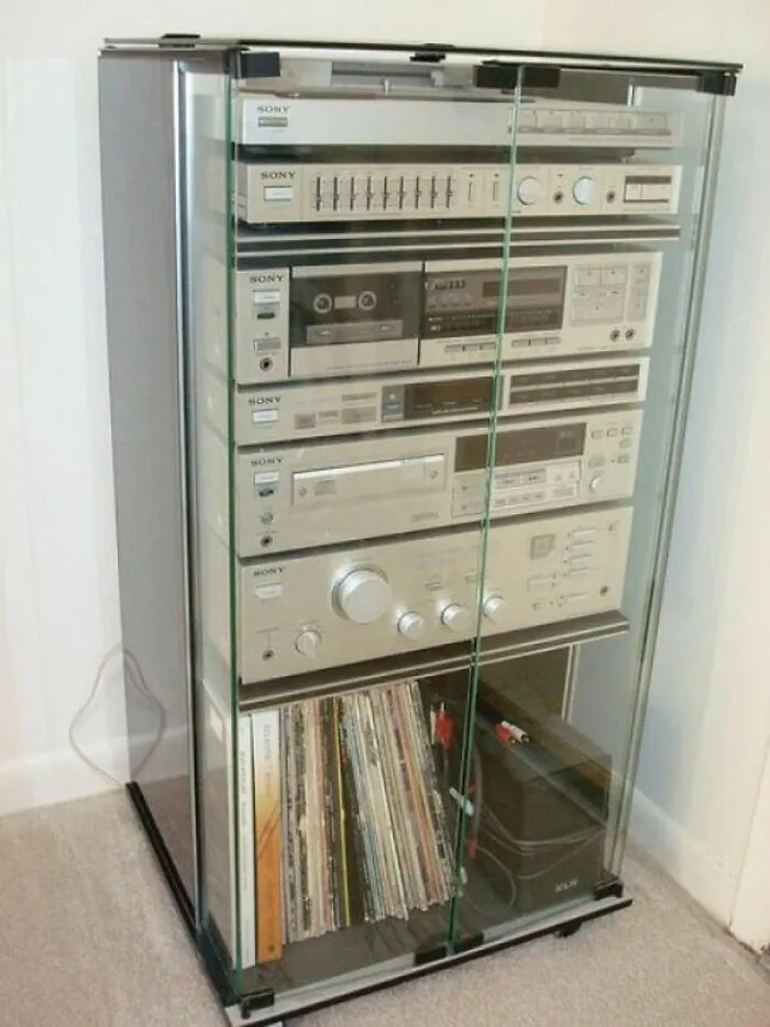 Vintage Sony stereo component system in a glass cabinet, showcased in nostalgic photos.
