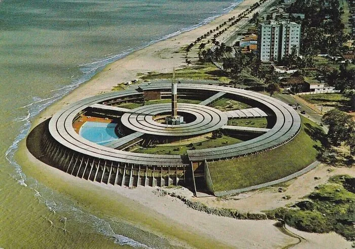 Circular strange building on the beach demonstrating unique architectural design