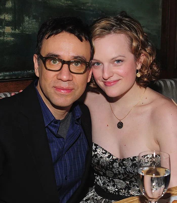 Fred Armisen and Elisabeth Moss posing closely together, representing one of the forgotten short celebrity marriages.