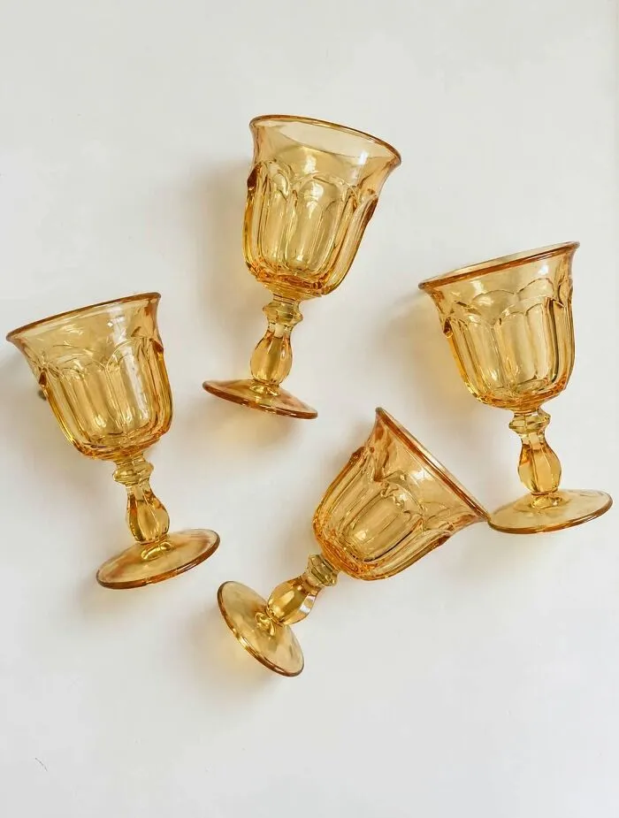 Set of four vintage amber-colored goblets thrift store finds