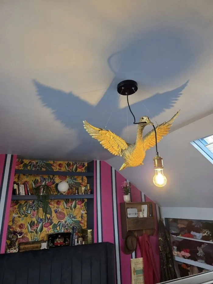 A flying goose chandelier as part of a creative home makeover.