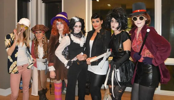 Group of friends dressed up in detailed Johnny Depp movie character Halloween costumes.