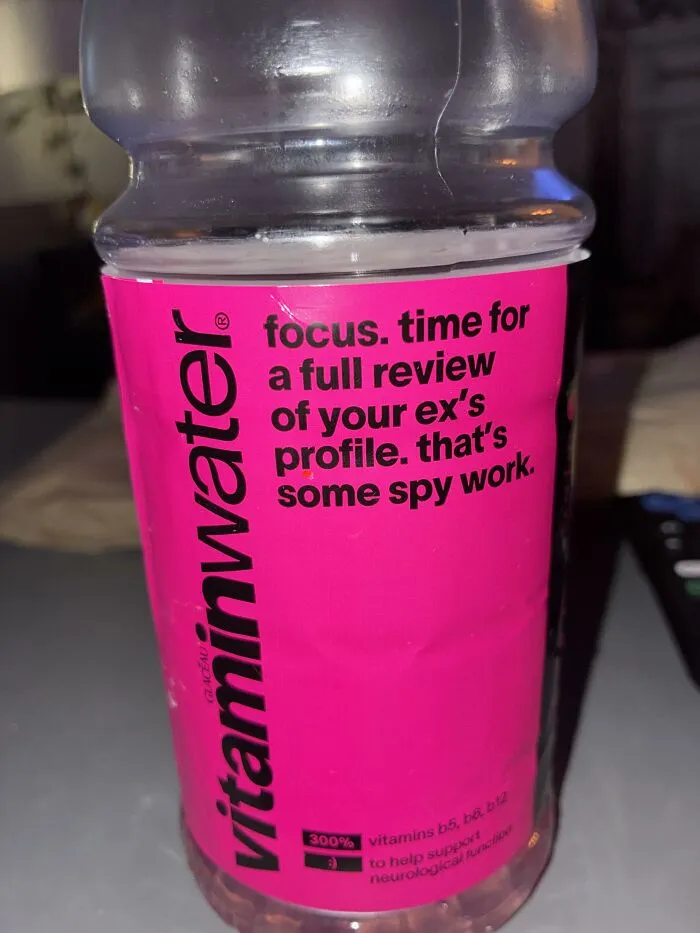 Vitaminwater bottle with questionable marketing text about exes showing advertising fails.