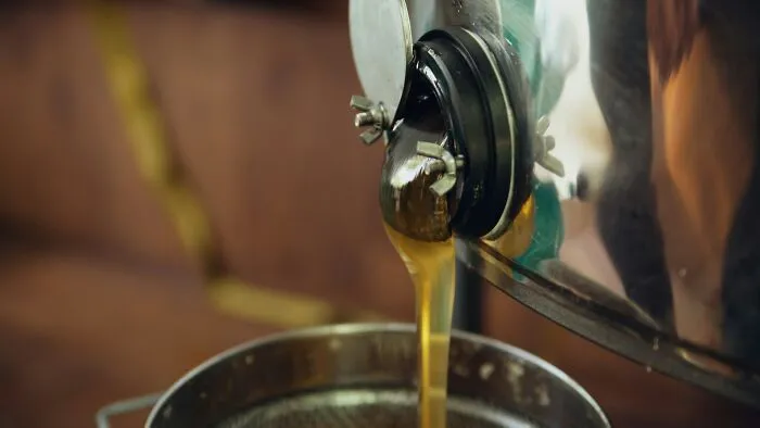 Thick liquid pouring from a metal container, showcasing practical emergency tips.