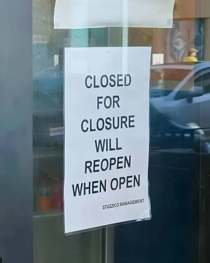 A funny sign on a glass door reading closed for closure, representing interesting photos.