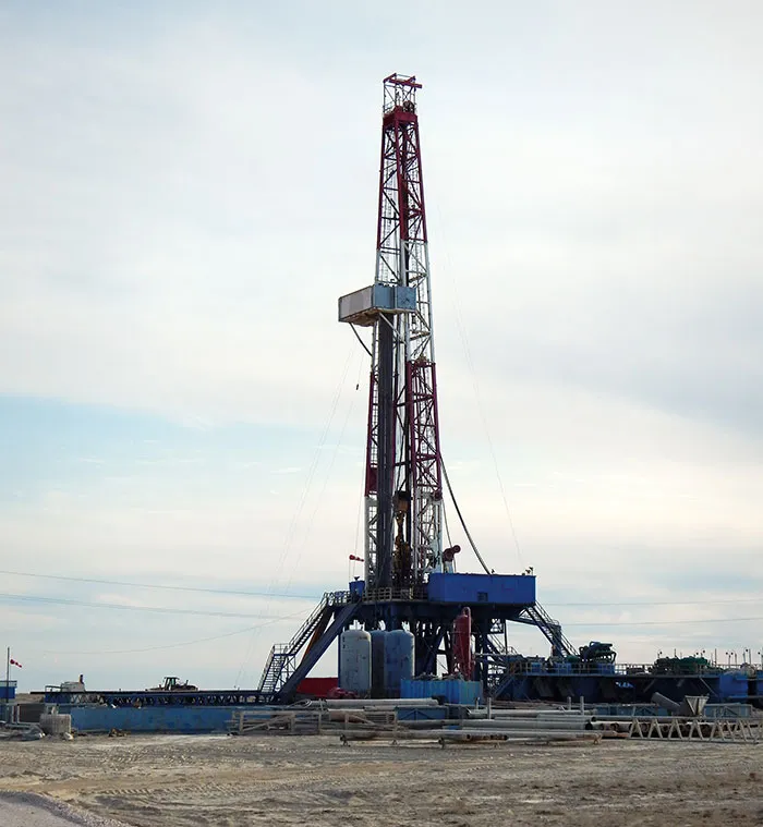 Oil rig drilling equipment at industrial job site