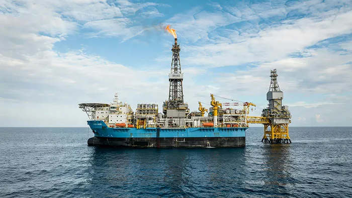 Offshore oil rig platform representing dangerous job with high pay