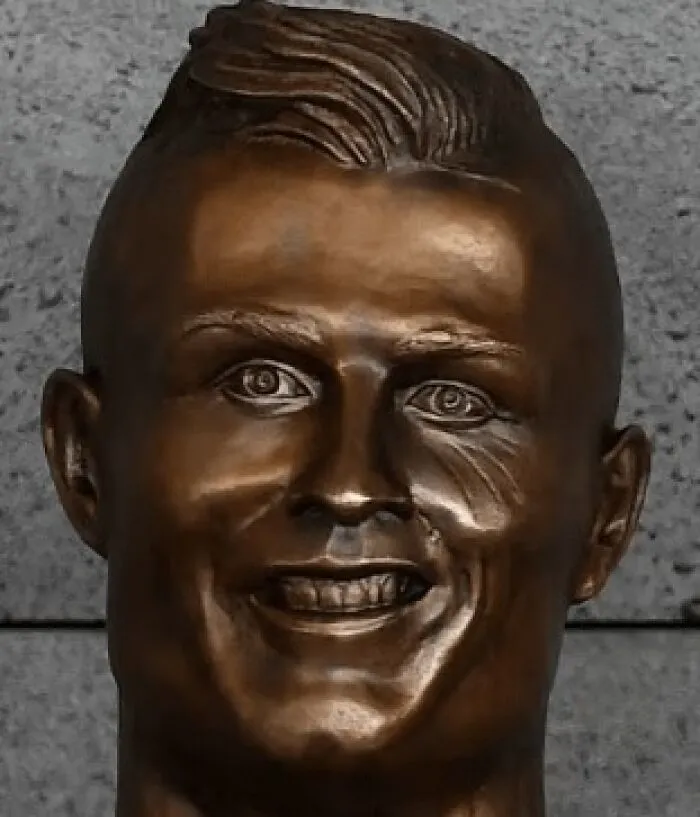Close up of the infamous and bizarre Cristiano Ronaldo bronze bust, a funny example of public art