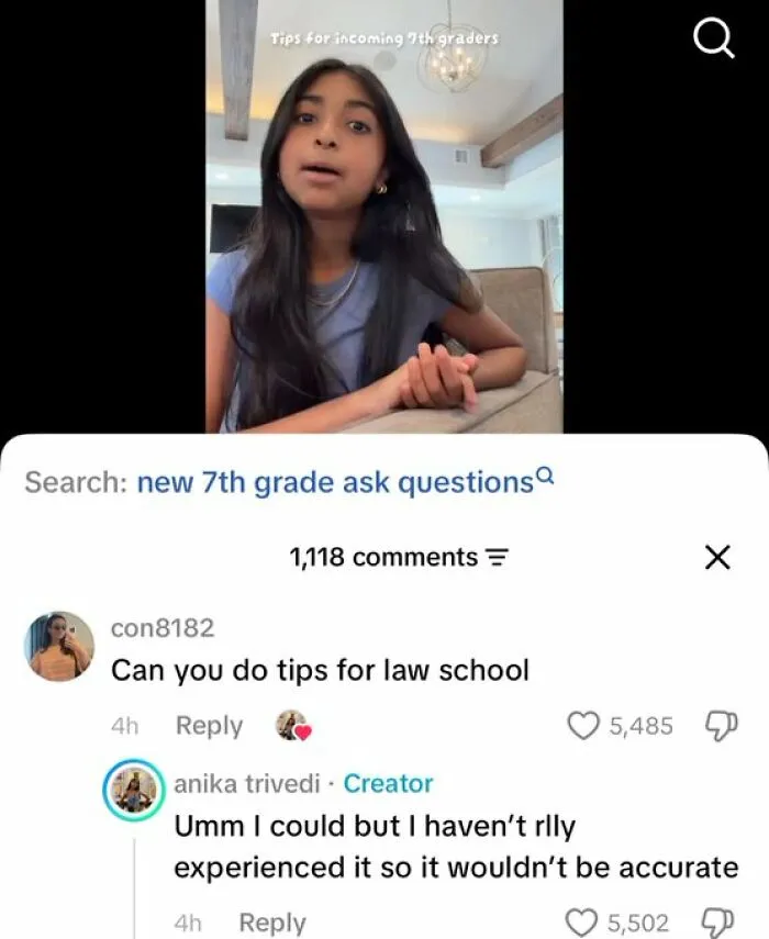 A young girl in a blue shirt giving advice on school, in a funny comments compilation.